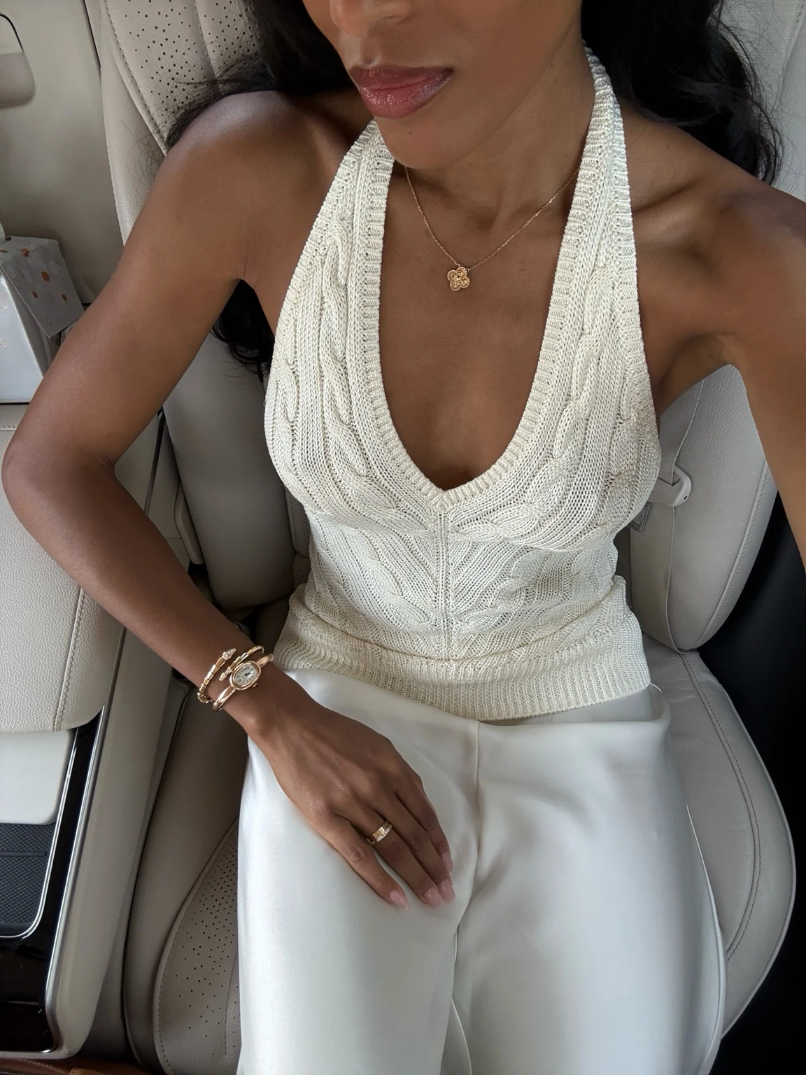 Cream knit and jewelry detail